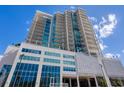 Modern high-rise building with glass and metal facade at 540 N Tamiami Trl # 1201, Sarasota, FL 34236