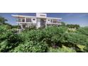 Luxury waterfront home nestled among lush greenery at 0 Casey Key Rd, Nokomis, FL 34275