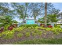 Community entrance sign with landscaping at 4708 Sabal Key Dr, Bradenton, FL 34203