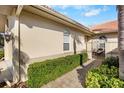 Walkway leading to a gated courtyard at 3314 Chelmsford Ct # 19, Sarasota, FL 34235