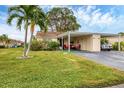 Condo with carport and small patio at 4803 Park Acres Dr, Bradenton, FL 34207