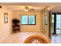 Bright living room with hardwood floors and access to a patio at 6447 Egret Ln # 413, Bradenton, FL 34210