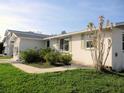 Well-maintained single-story home featuring a lush green lawn at 840 Harvard St, Englewood, FL 34223