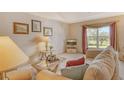 Cozy living room with a view, featuring comfortable seating at 381 Bobby Jones Rd # 381, Sarasota, FL 34232
