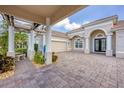 Covered entryway leading to a beautiful home's entrance at 575 Fore Dr, Bradenton, FL 34208