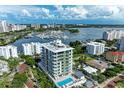 Highrise building showcasing a waterfront location and city views at 111 Golden Gate Pt # 402, Sarasota, FL 34236