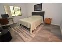 Bright bedroom with a comfortable bed and plenty of natural light at 1508 Pelican Cove Rd # Gr233, Sarasota, FL 34231