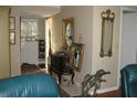 Bright entryway with decorative accents and wine storage at 3820 Ironwood Ln # 106-I, Bradenton, FL 34209
