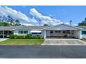 Community view showing multiple houses and landscaping at 6079 Coral Way, Bradenton, FL 34207