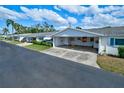 Aerial view of community with several houses at 6079 Coral Way, Bradenton, FL 34207