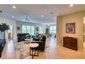 Spacious living room with ample natural light and comfortable seating at 8115 Stirling Falls Cir, Sarasota, FL 34243