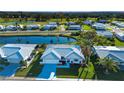 Aerial view of a single-story home in a golf course community at 1318 Bottlebrush Dr, Bradenton, FL 34208