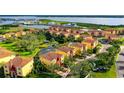 Aerial view of a beautiful townhome community near the water at 1602 3Rd Street E Cir, Palmetto, FL 34221