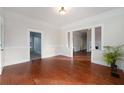 Living room featuring hardwood floors and an open concept at 903 W Reynolds St, Plant City, FL 33563