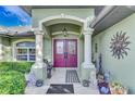 Inviting entryway with double doors and decorative accents at 17040 Kellog Ave, Port Charlotte, FL 33954