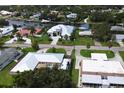 Aerial view showcasing a home's location in a waterfront community at 1860 Southpointe Dr, Sarasota, FL 34231