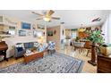 Bright and spacious living room featuring hardwood floors and an open floor plan at 2057 Garden Pkwy, Bradenton, FL 34205