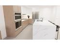 Modern kitchen with island and stainless steel appliances at 4950 Remington Dr # 407, Sarasota, FL 34234