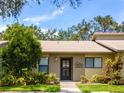 Condo exterior featuring a well-maintained lawn and walkway at 6016 28Th W St # 6016, Bradenton, FL 34207