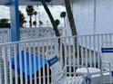Ocean view from private balcony with patio furniture at 475 Benjamin Franklin Dr # 202, Sarasota, FL 34236