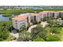 Luxury condo community by the water, with lush landscaping at 5450 Eagles Point Cir # 405, Sarasota, FL 34231