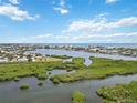 Waterfront view showcasing a beautiful coastline at 5450 Eagles Point Cir # 405, Sarasota, FL 34231