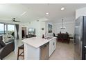 Modern kitchen with island and stainless steel appliances at 1010 Tidewater Shores Loop # 201, Bradenton, FL 34208