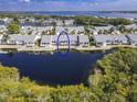 Waterfront villa with a patio and beautiful water views at 1256 Spoonbill Landings Cir, Bradenton, FL 34209