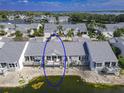Villa featuring a private patio overlooking the water at 1256 Spoonbill Landings Cir, Bradenton, FL 34209