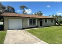 Charming ranch-style home with a spacious yard at 4121 Durant St, Port Charlotte, FL 33948