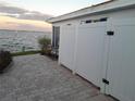 Private outdoor shower with fenced enclosure at 957 Spanish N Dr, Longboat Key, FL 34228