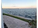 Stunning waterfront view from a patio at 957 Spanish N Dr, Longboat Key, FL 34228