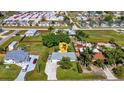 House in a residential neighborhood with surrounding houses and vegetation at 312 San Marie Dr, Punta Gorda, FL 33950