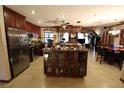 Open kitchen boasts granite countertops and stainless steel appliances at 1820 E Leewynn Dr, Sarasota, FL 34240