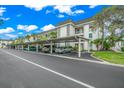 Covered parking with ample space for residents and guests at 4360 Chatham Dr # 108, Longboat Key, FL 34228