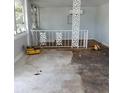 Spacious living room with hardwood floors and a unique architectural element at 5 Palm Ave, Bradenton, FL 34208