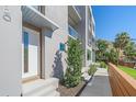 Modern townhouse with private entrance, walkway, and landscaping at 1720 Alderman St, Sarasota, FL 34236