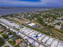 Overhead shot showcases this home's community location near shopping and waterfront access at 2107 Palma Sola Blvd # 84, Bradenton, FL 34209