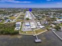 Breathtaking aerial view of the community near the water, highlighting the tranquil setting at 2107 Palma Sola Blvd # 84, Bradenton, FL 34209