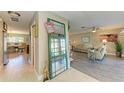 Inviting entryway with a view into the living room and dining area at 220 Monet Dr, Nokomis, FL 34275