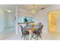 Bright dining area with table and chairs, near kitchen at 7135 27Th W Ave # 7135, Bradenton, FL 34209