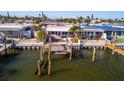 Waterfront home with private dock and boat slip at 19 Seaside Ct, Holmes Beach, FL 34217