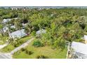 Aerial view of a single Gathering home and lot at 25318 Marion Ave, Punta Gorda, FL 33950