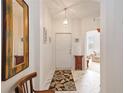 Bright and airy entryway with marble tile flooring and decorative accents at 4209 Cascade Falls Dr, Sarasota, FL 34243