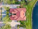 Luxury home with red tile roof and waterfront view at 918 River Basin Ct # 101A, Bradenton, FL 34212