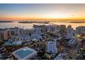 Aerial view of the city skyline at sunset, highlighting the property's location at 1335 2Nd St # 301, Sarasota, FL 34236