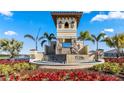 Impressive entrance to the community with a fountain and landscaping at 17921 Canopy Pl, Bradenton, FL 34211
