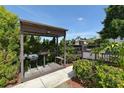 Community BBQ area with covered structure and seating at 3609 59Th W Ave # 4045, Bradenton, FL 34210