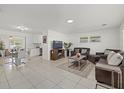 Open concept living and dining area with tile floors at 5315 24Th St W, Bradenton, FL 34207