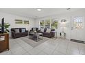 Living Room with tiled floors and comfortable seating at 5315 24Th St W, Bradenton, FL 34207